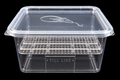 Side view of the clear small SIM egg hatching container showing its lid, raised incubation grid, and fill line against a black background.