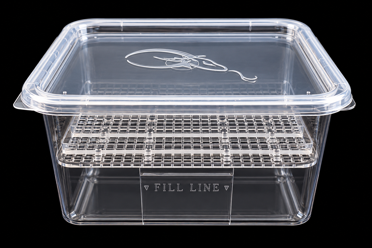 Side view of the clear small SIM egg hatching container showing its lid, raised incubation grid, and fill line against a black background.